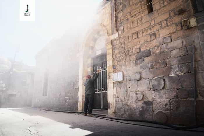 4تنظيف الواجهة الرئيسية لجامع العصياتي في حي باب الدريب